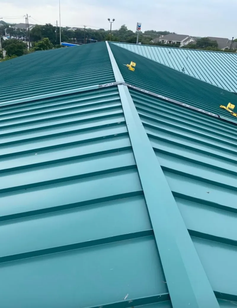 Green commercial metal roof ridge and valley for Metal Roof Repair in Parma